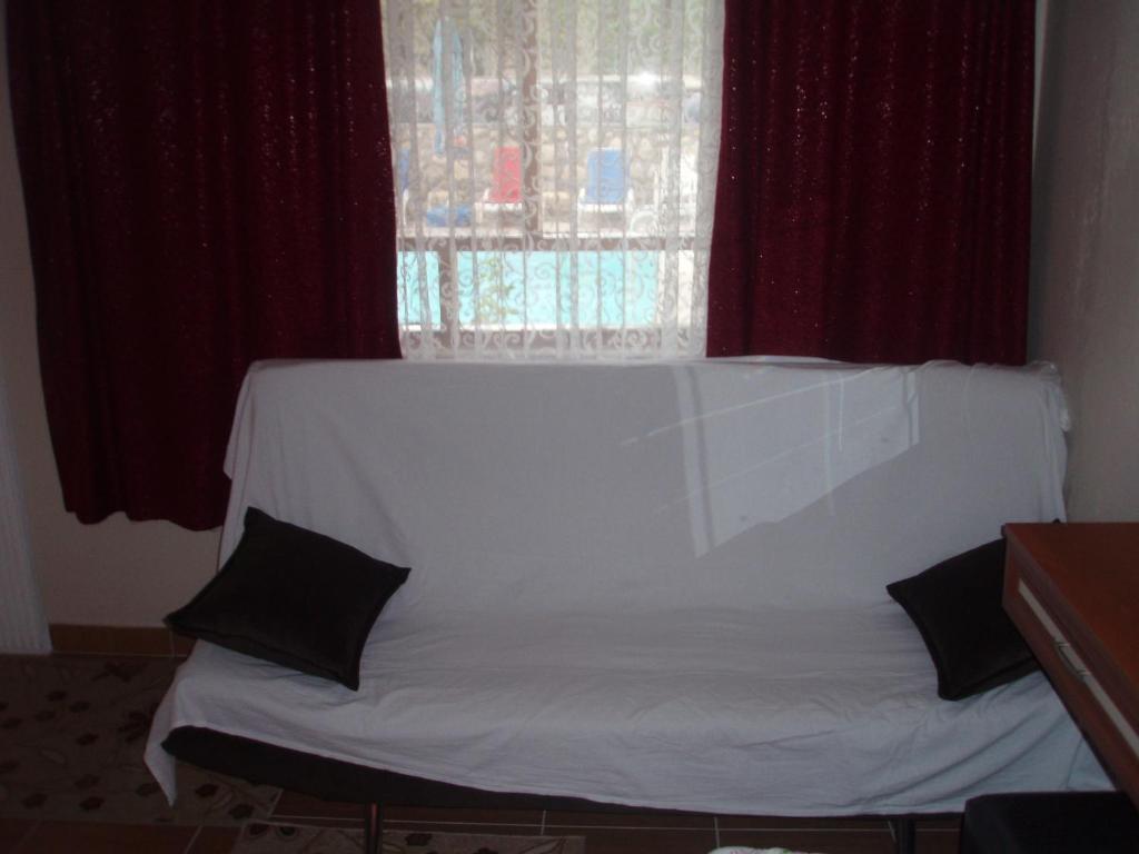 Postel nebo postele na pokoji v ubytování Hotel Pamukkale