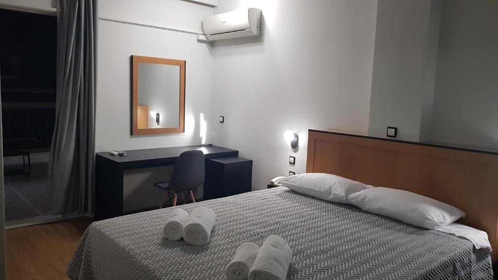 Postel nebo postele na pokoji v ubytování Savoy Hotel