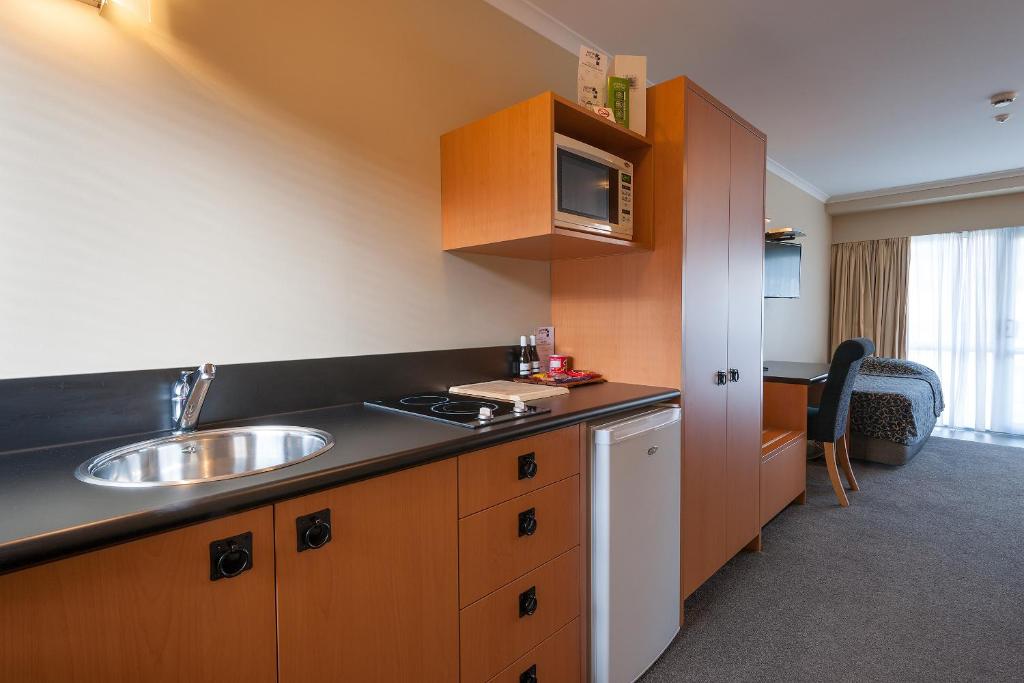 Kuchyň nebo kuchyňský kout v ubytování Beachcomber Inn Picton