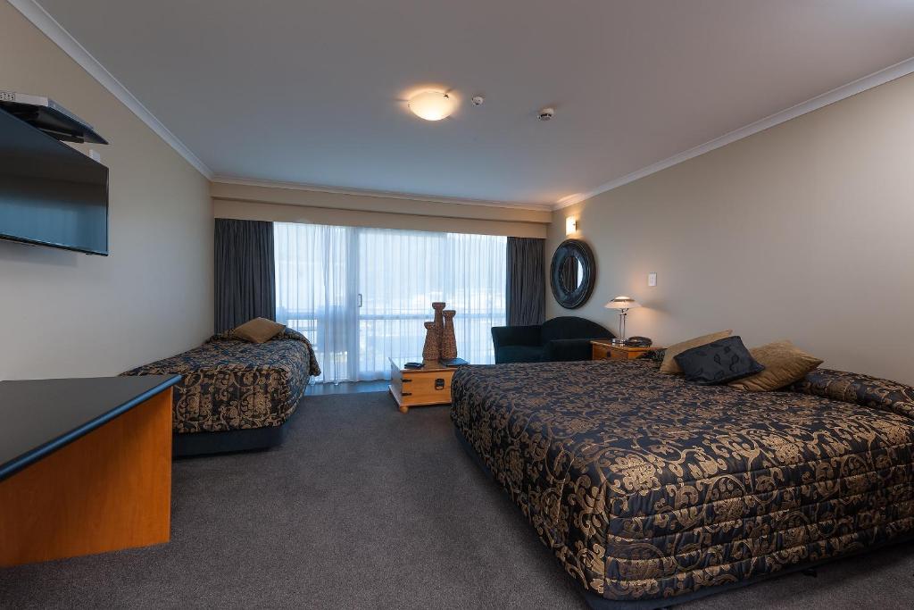 Postel nebo postele na pokoji v ubytování Beachcomber Inn Picton