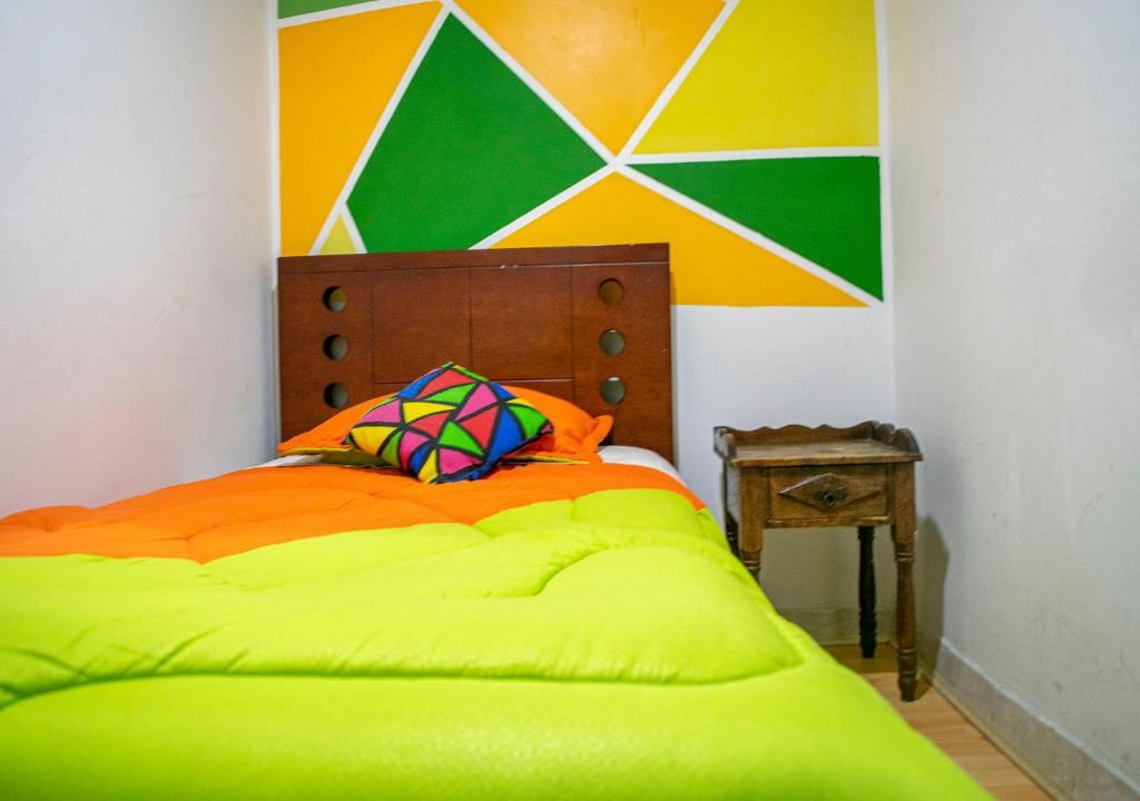 Postel nebo postele na pokoji v ubytování Onde Pepe Hostel