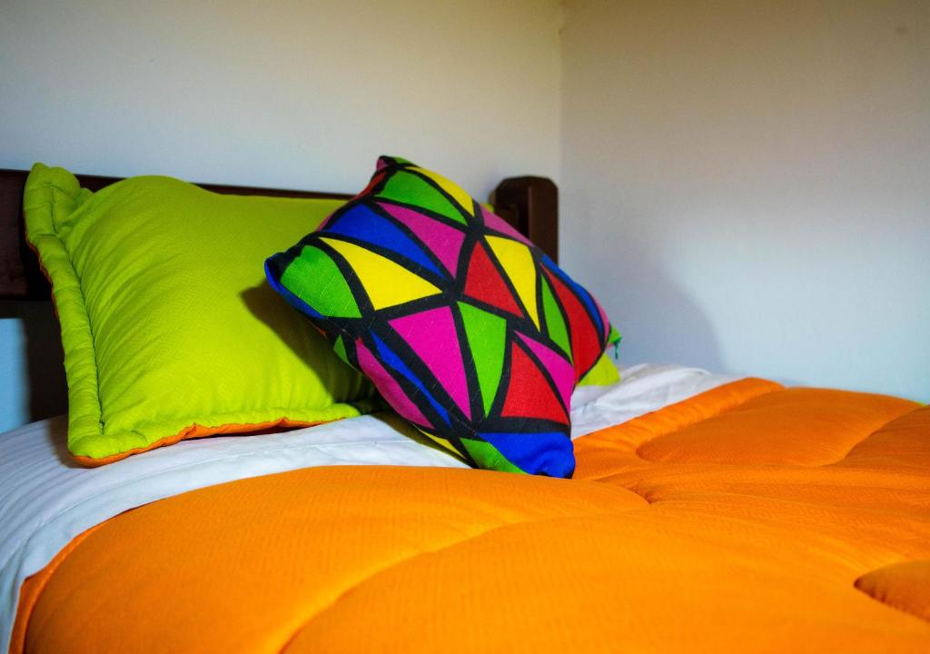 Postel nebo postele na pokoji v ubytování Onde Pepe Hostel