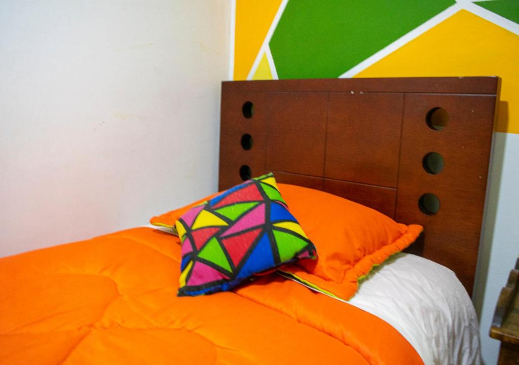 Postel nebo postele na pokoji v ubytování Onde Pepe Hostel