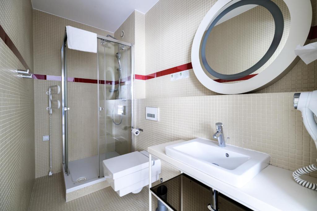 Kúpeľňa v ubytovaní Home Aparthotel