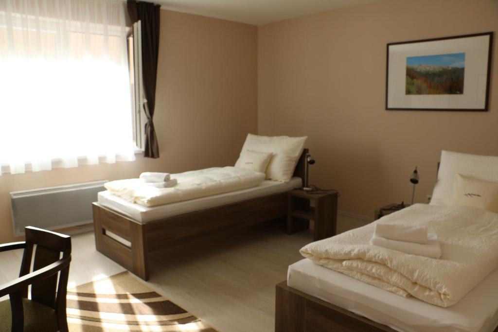 Postel nebo postele na pokoji v ubytování Wellness Simply Relax - Chopok- privátna vírivka, sauna
