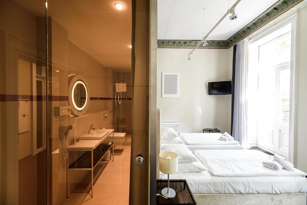 Kúpeľňa v ubytovaní Home Aparthotel