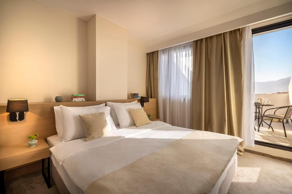 Voodi või voodid majutusasutuse Aminess Younique Liburna Hotel toas