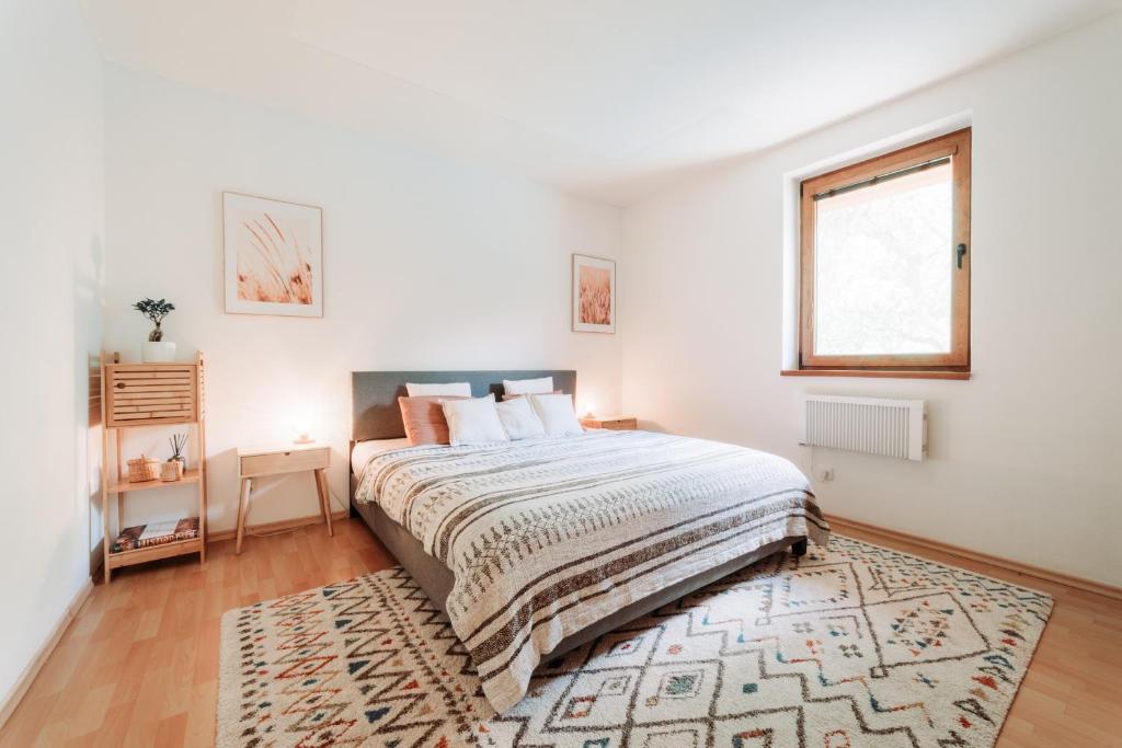A bed or beds in a room at Holiday house Liptovský Ján