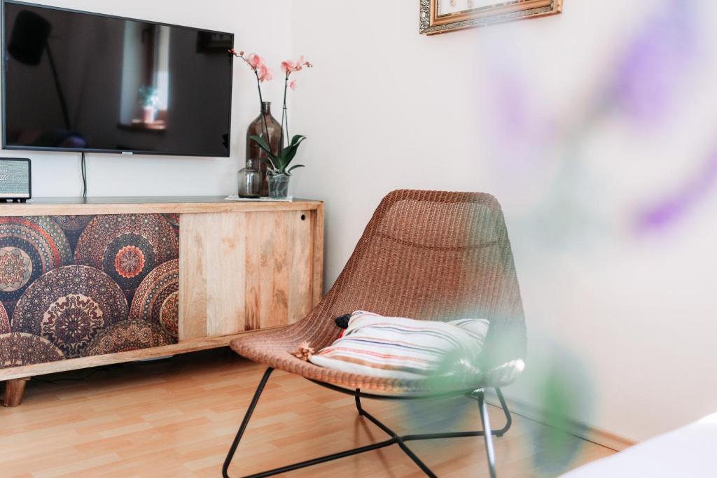 A television and/or entertainment centre at Holiday house Liptovský Ján