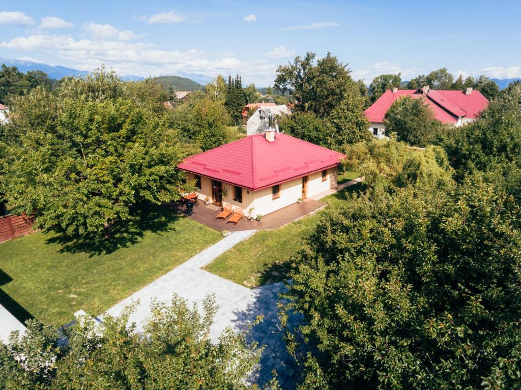 an aerial view of a house with a red roof at Holiday house Liptovský Ján in Liptovský Ján