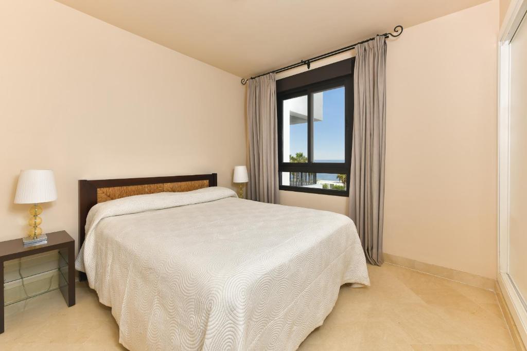 Postel nebo postele na pokoji v ubytování Apartamento vista mar frontal con parking