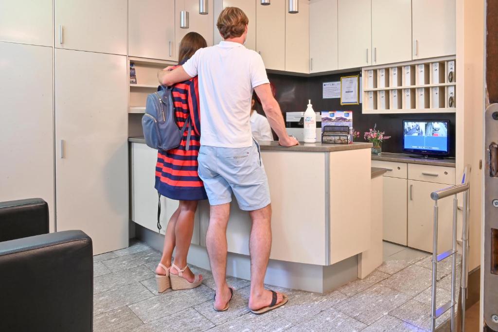 Kuchyň nebo kuchyňský kout v ubytování Hotel Marco's