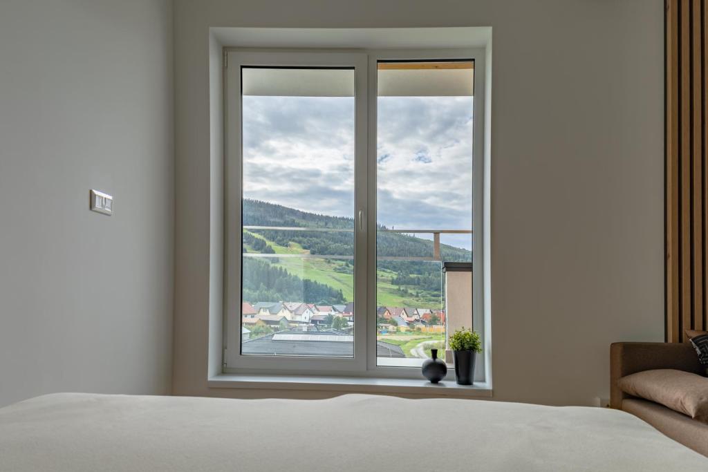Nespecifikovaný výhled na hory nebo výhled na hory při pohledu z apartmánu