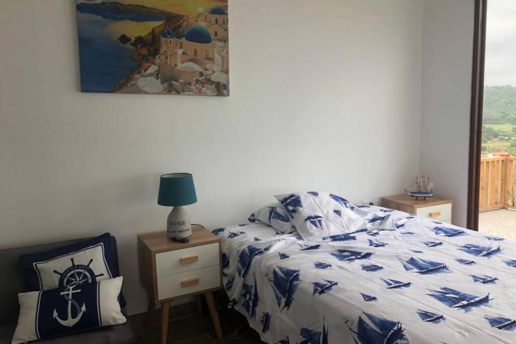 Postel nebo postele na pokoji v ubytování Casa de Playa Koumpí Beach