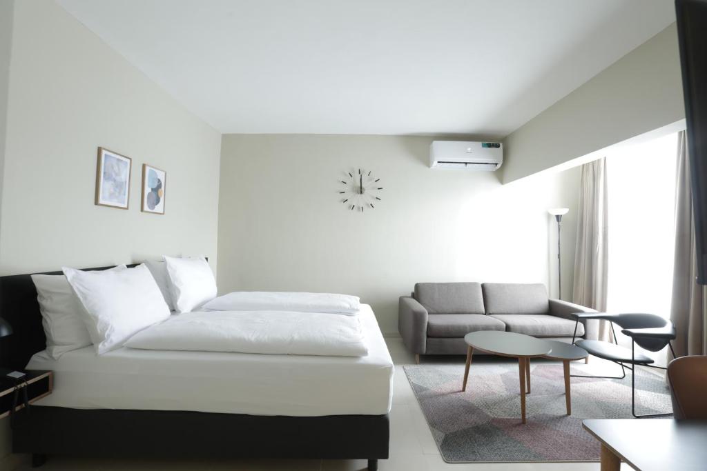 Rúm í herbergi á Nordic Hotel Lagos