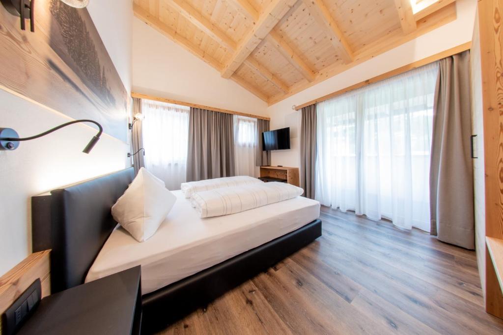 Postel nebo postele na pokoji v ubytování CHALET NORA