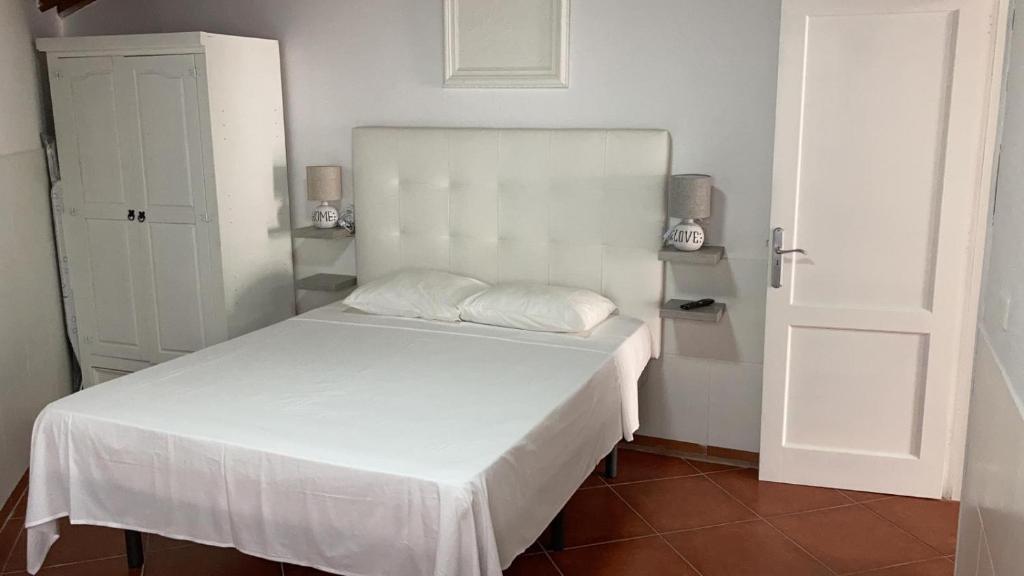 Postel nebo postele na pokoji v ubytování APARTAMETOS ELENA 11