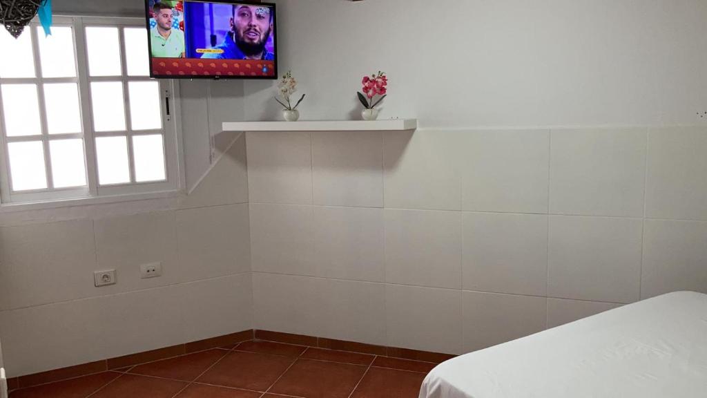 Postel nebo postele na pokoji v ubytování APARTAMETOS ELENA 11