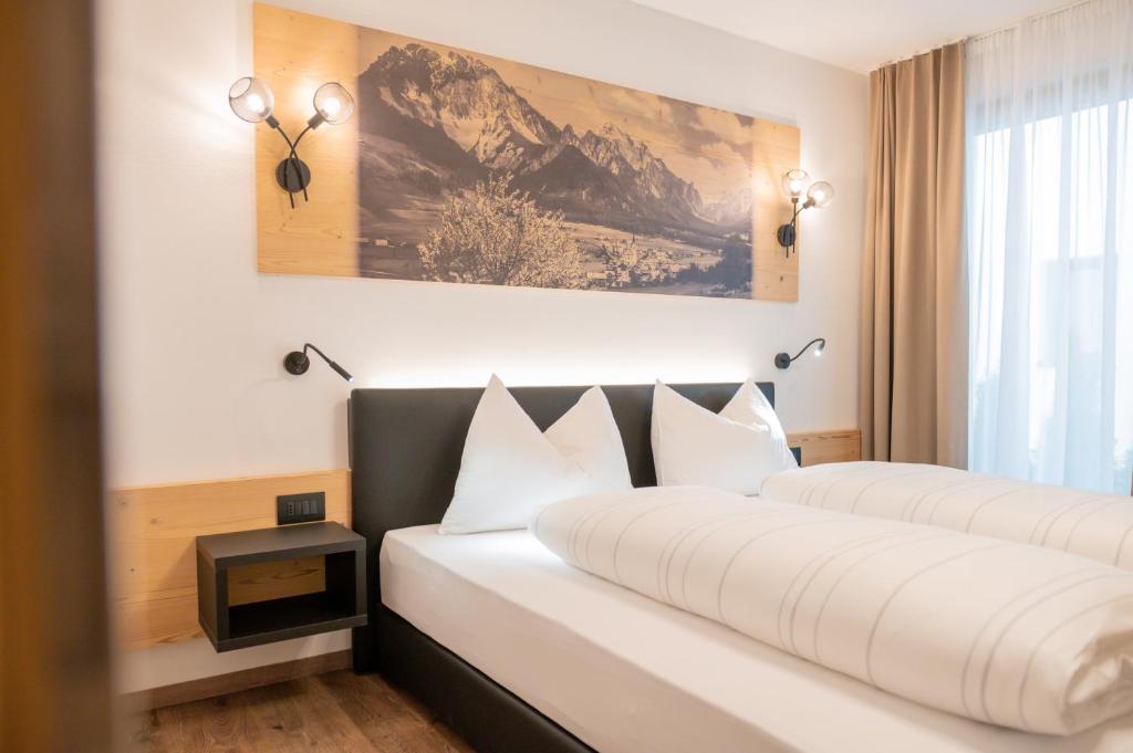 Postel nebo postele na pokoji v ubytování CHALET NORA