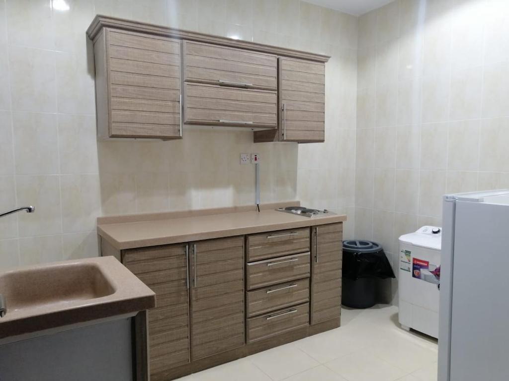 Kuchyň nebo kuchyňský kout v ubytování Fakhamat Al Orjoana & Suites