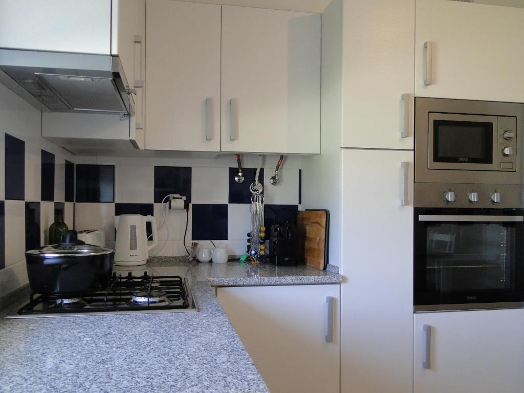 Kuchyň nebo kuchyňský kout v ubytování Apartment Vista Verde