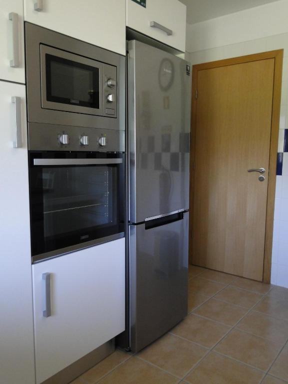 Kuchyň nebo kuchyňský kout v ubytování Apartment Vista Verde