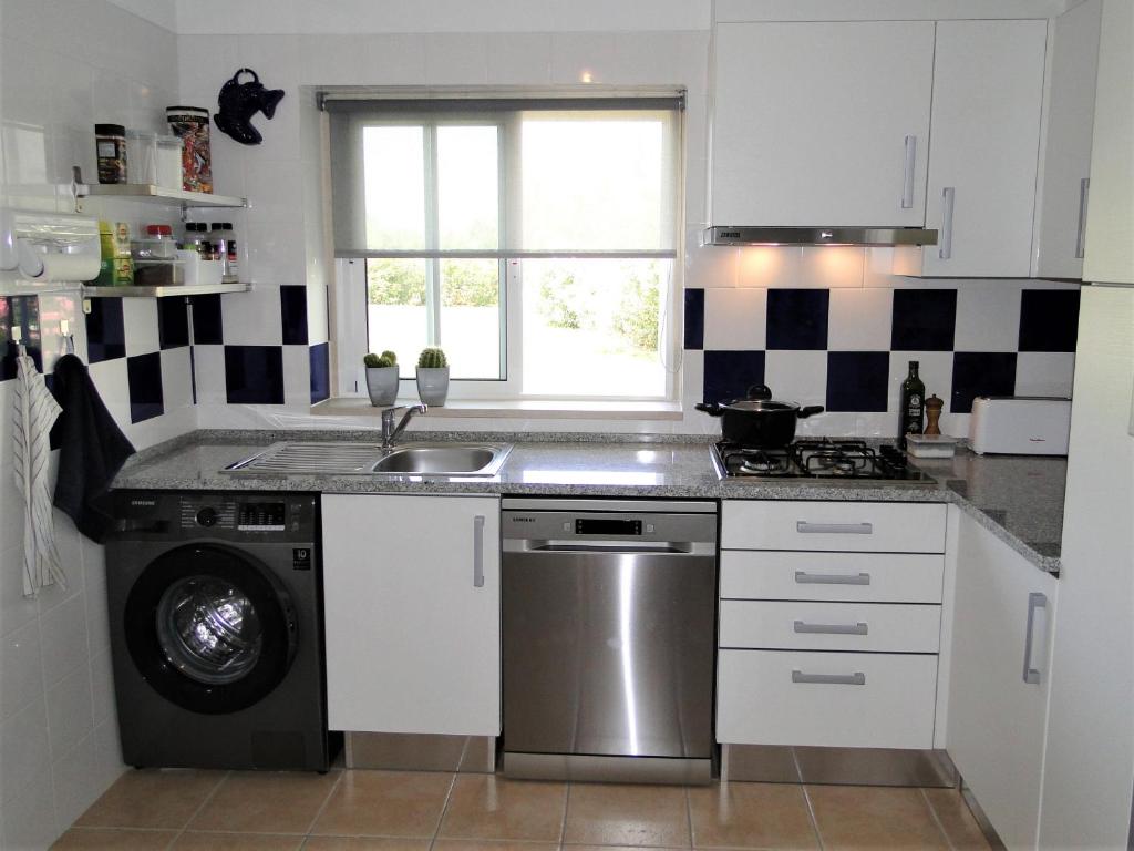Kuchyň nebo kuchyňský kout v ubytování Apartment Vista Verde