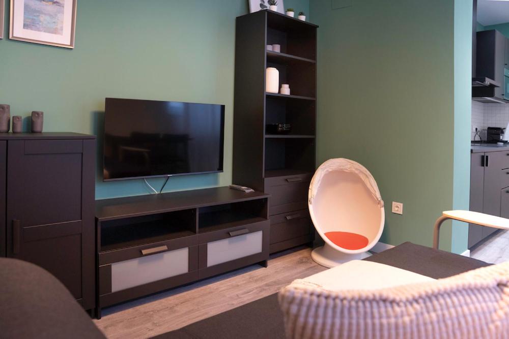 A television and/or entertainment centre at Zamora Suites Central