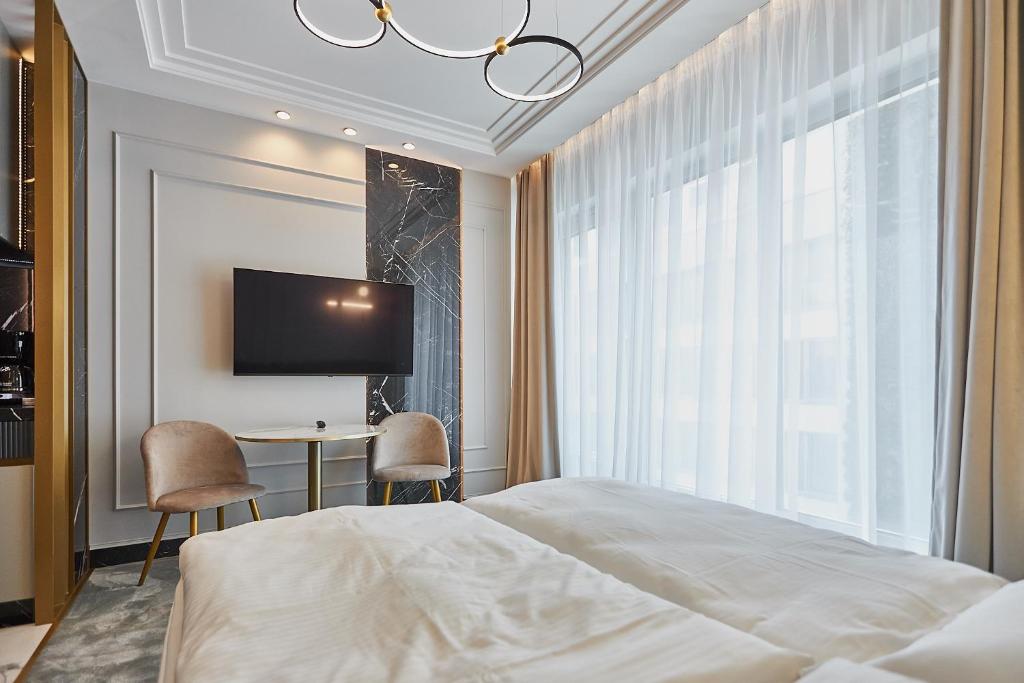 Posteľ alebo postele v izbe v ubytovaní Apartamenty Świnoujście - Lividus 323