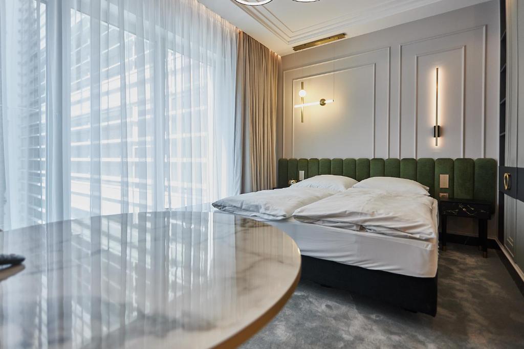 Posteľ alebo postele v izbe v ubytovaní Apartamenty Świnoujście - Lividus 323