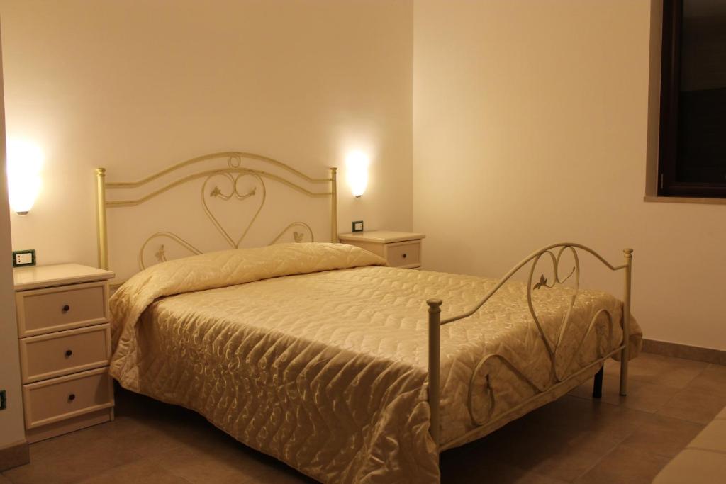 Postel nebo postele na pokoji v ubytování Villa Lorenza