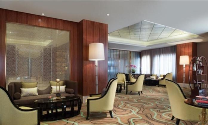 Posezení v ubytování Ramada Plaza Tianlu Hotel