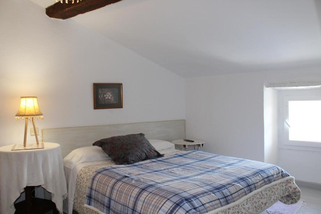Postel nebo postele na pokoji v ubytování vaquero casa rural alquiler completo
