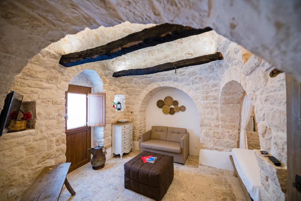 Część wypoczynkowa w obiekcie Il Trullo della Rondinina
