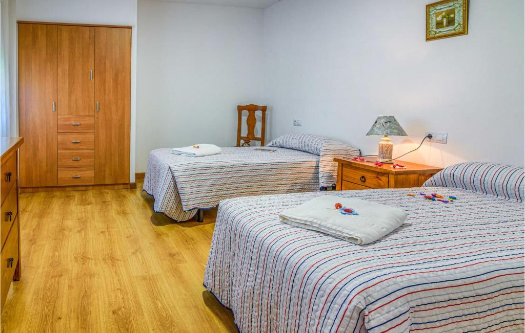 Posteľ alebo postele v izbe v ubytovaní 2 Bedroom Nice Apartment In La Omañuela