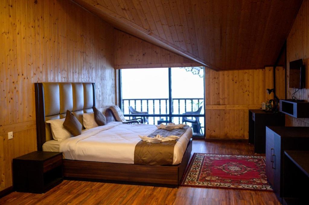 Postel nebo postele na pokoji v ubytování Istana Resort & Spa