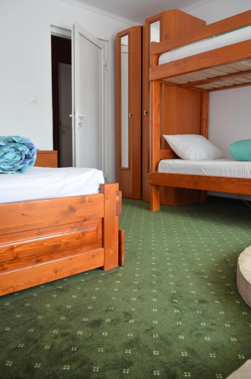 Postel nebo postele na pokoji v ubytování Vila Liliacul