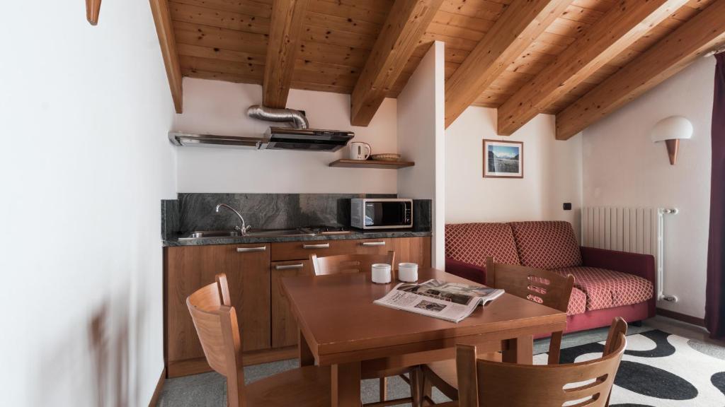 Kuchyň nebo kuchyňský kout v ubytování Residence Pizzo Scalino