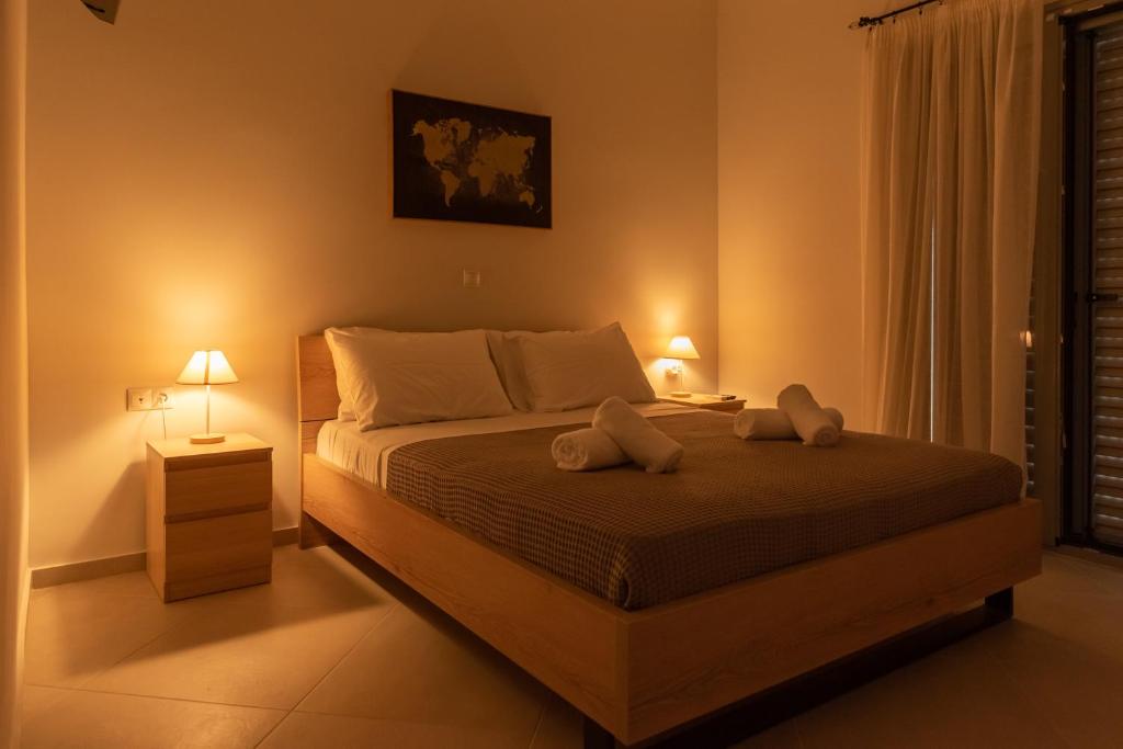 Кровать или кровати в номере Garden House Preveza
