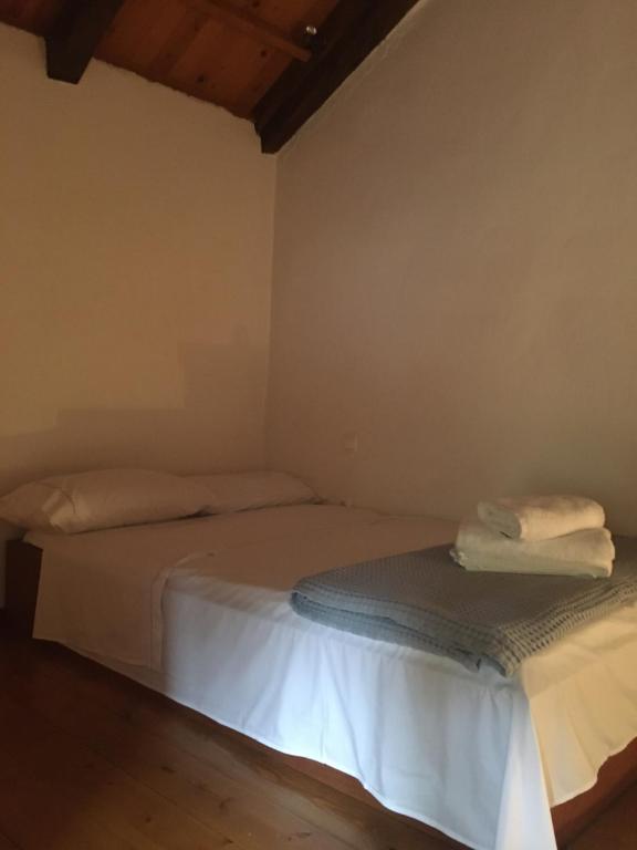 Posteľ alebo postele v izbe v ubytovaní Red Villa's Guesthouse