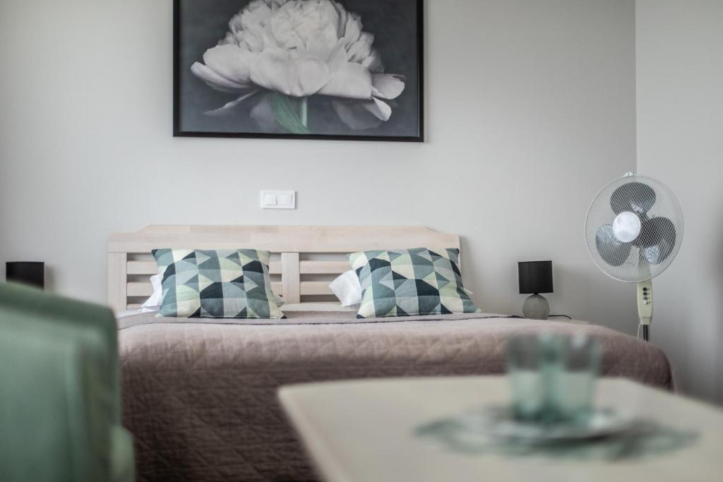 Postel nebo postele na pokoji v ubytování Hotel Mezaparks