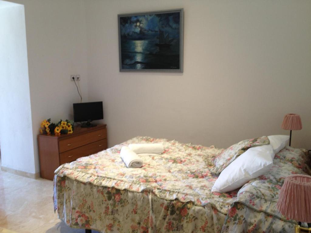 Postel nebo postele na pokoji v ubytování Hotel Comodoro