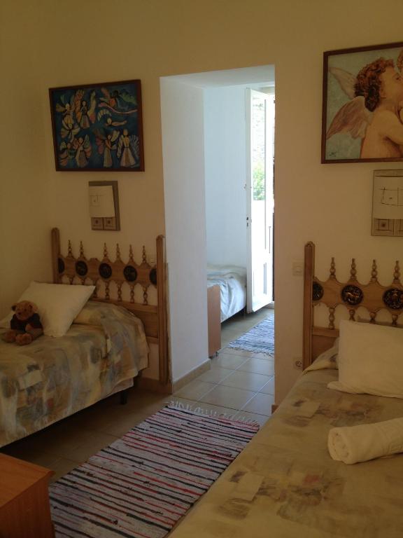 Postel nebo postele na pokoji v ubytování Hotel Comodoro