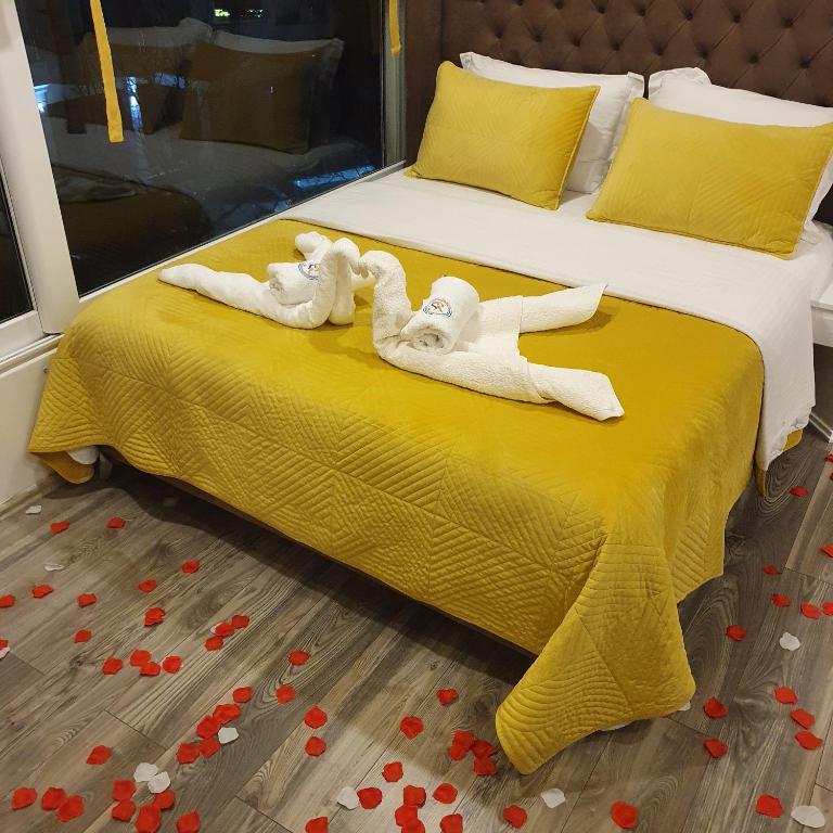Postel nebo postele na pokoji v ubytování Hotel Ramo Saranda