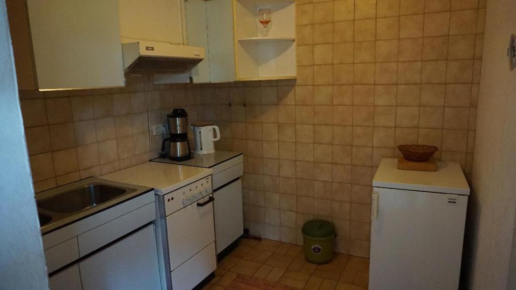 Kuchyň nebo kuchyňský kout v ubytování Gästehaus Buchinger