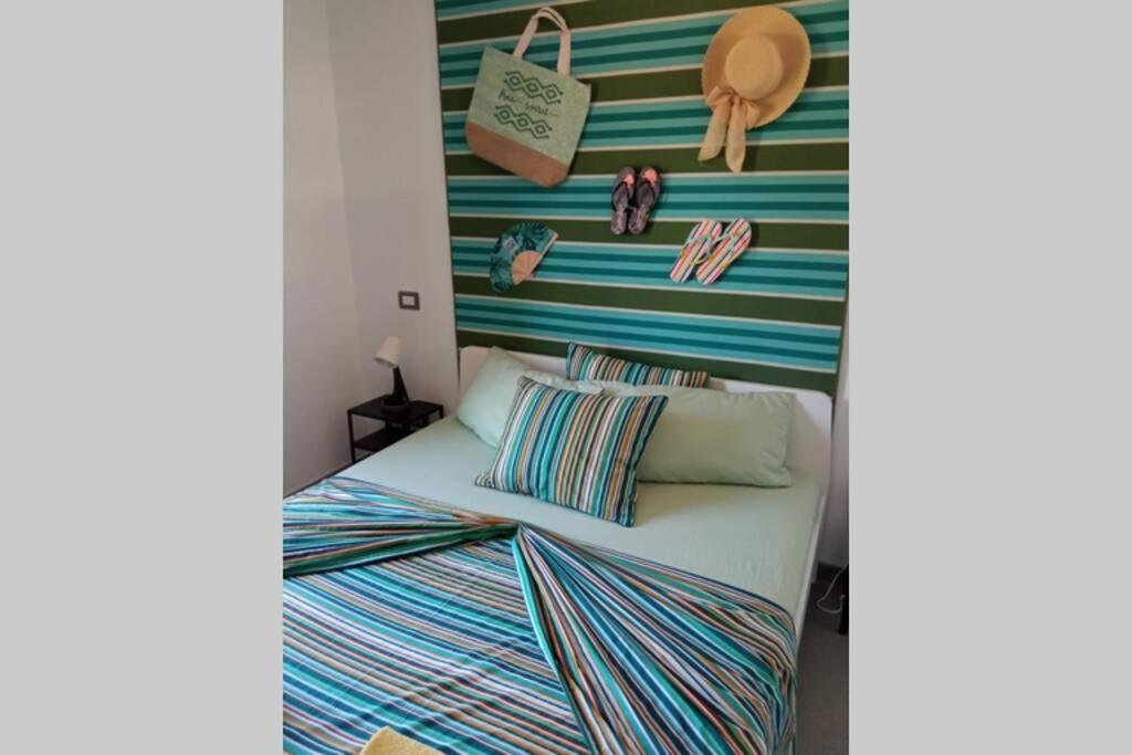 Łóżko lub łóżka w pokoju w obiekcie GLAMOUR MASPALOMAS - near MELONERAS