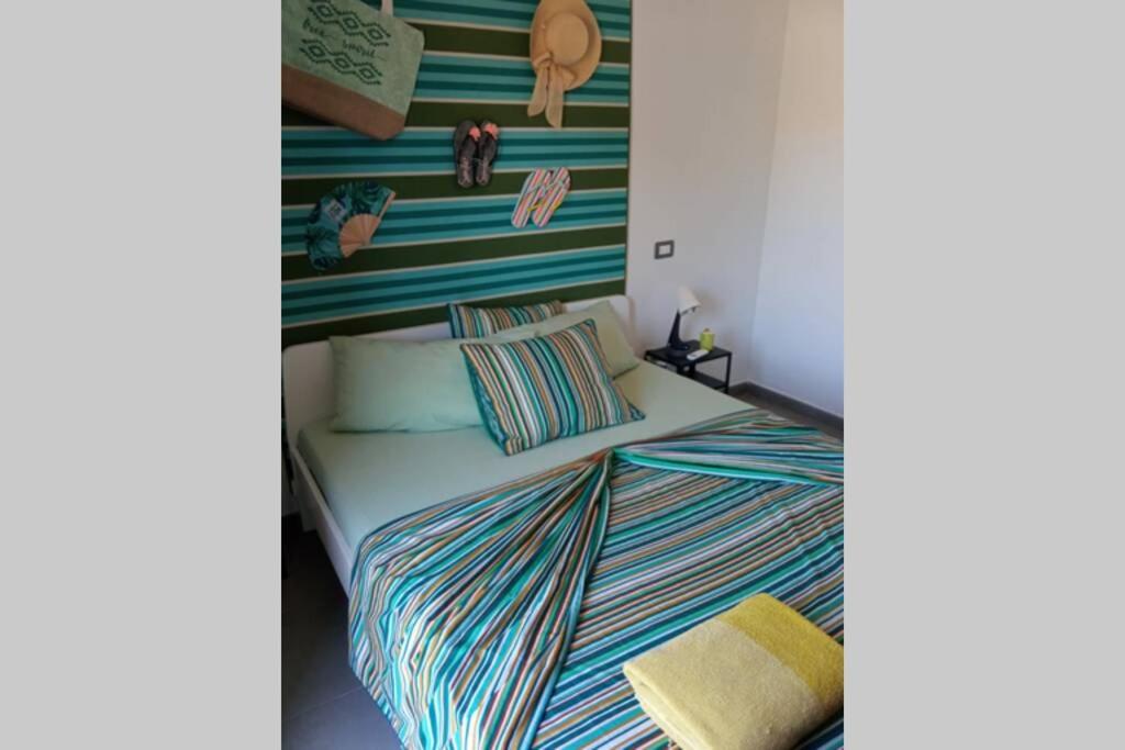 Łóżko lub łóżka w pokoju w obiekcie GLAMOUR MASPALOMAS - near MELONERAS