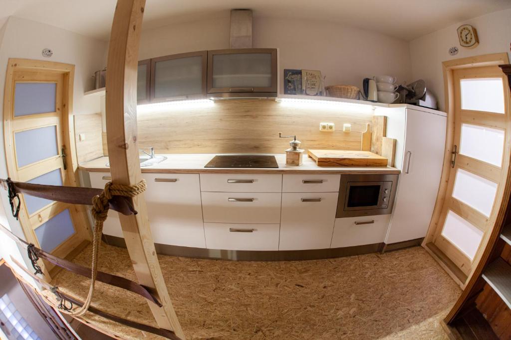 Kuchyň nebo kuchyňský kout v ubytování Apartman Vejminek