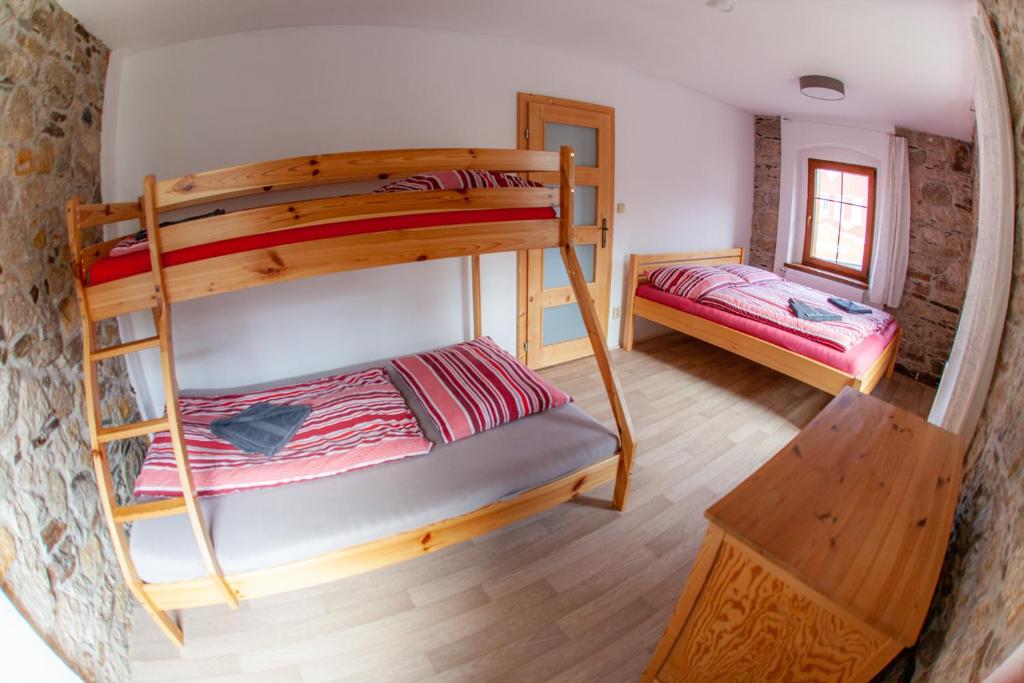 Postel nebo postele na pokoji v ubytování Apartman Vejminek