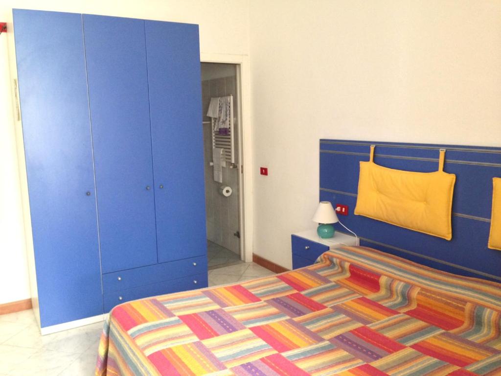 Postel nebo postele na pokoji v ubytování Le Conchiglie